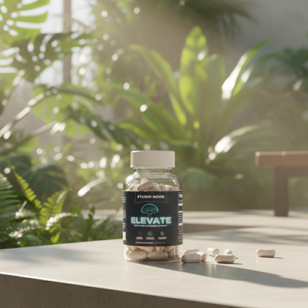Bottle of 'Elevate' supplements on a table with plants in the background